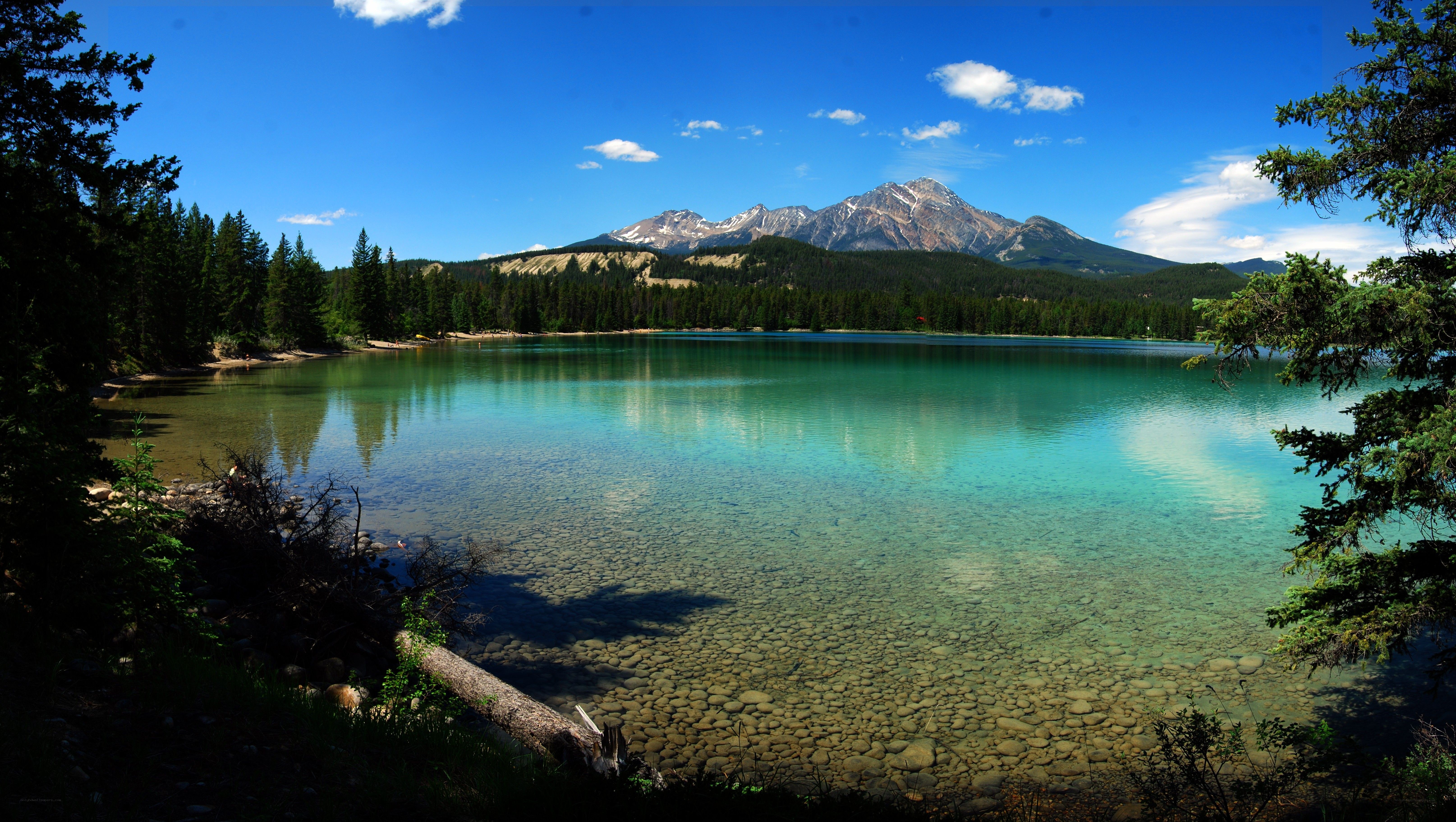 Clear lake with mountain view