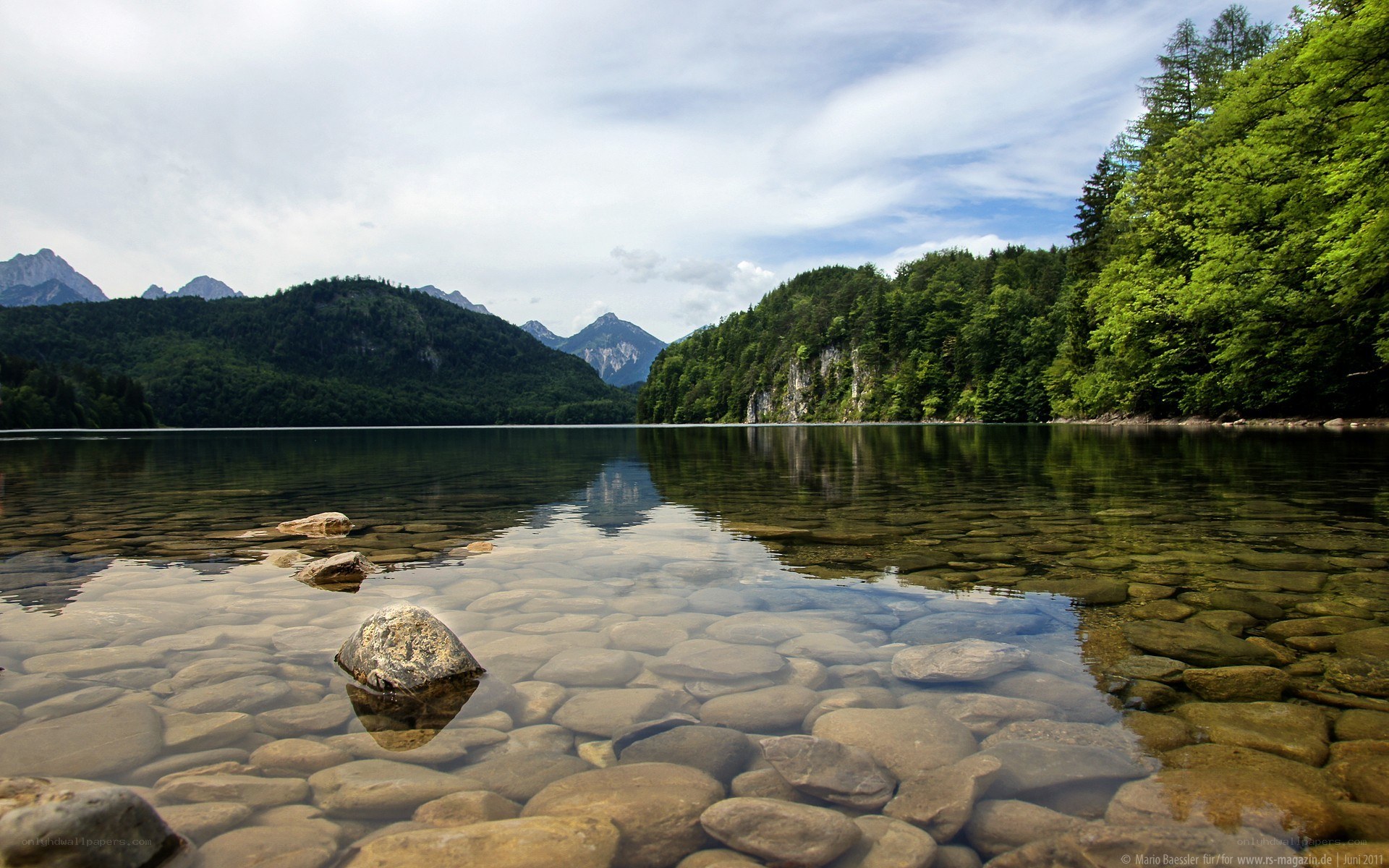 Clear lake with mountain view