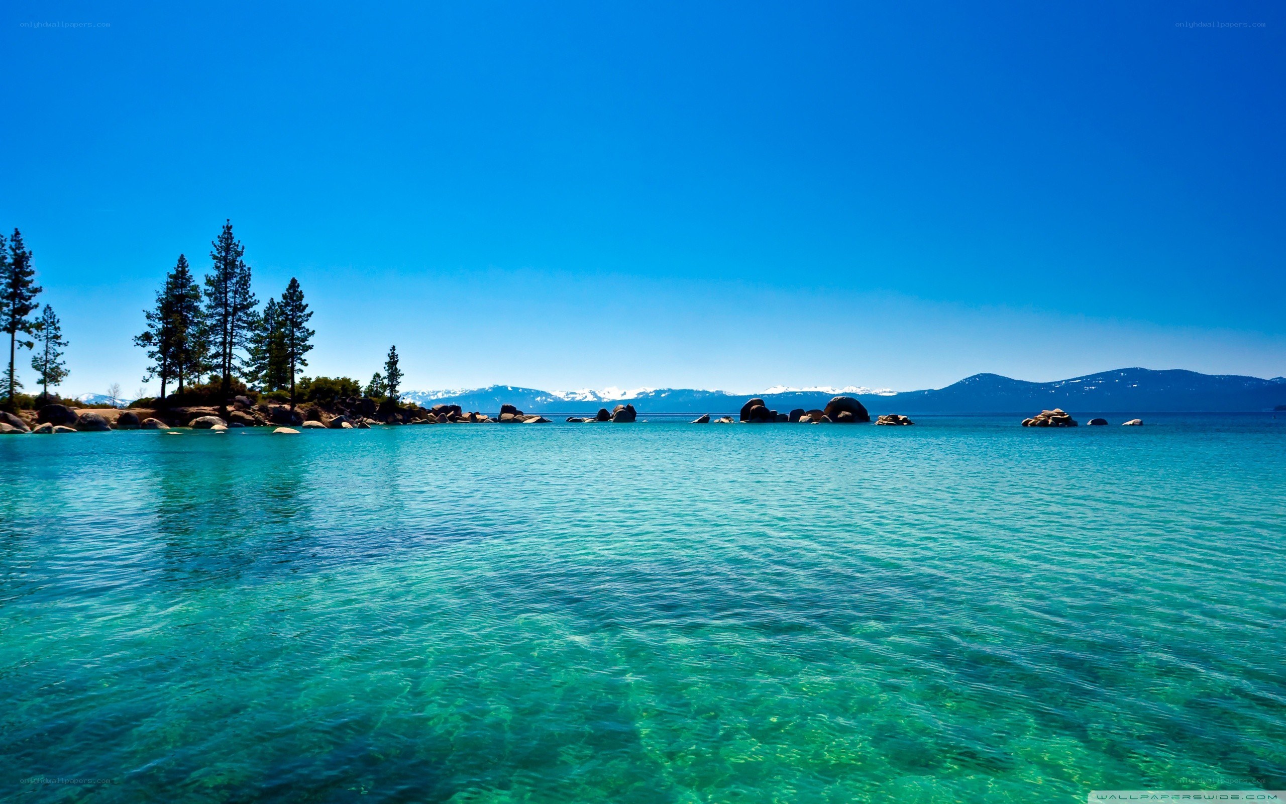 Clear lake with mountains