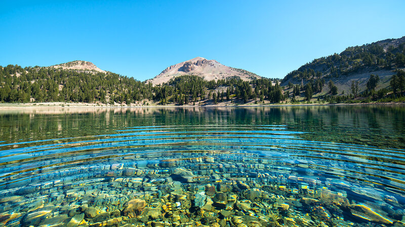Clear Lake with Mountains — Blue, Serene, Afternoon, Photograph, Trees, Rocks