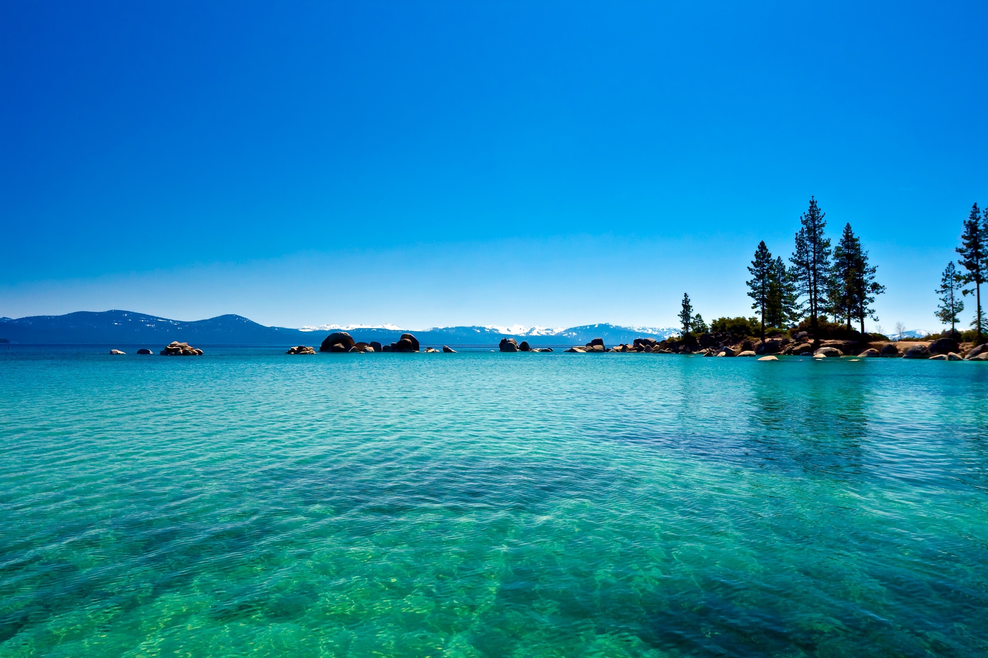 Clear lake with mountains