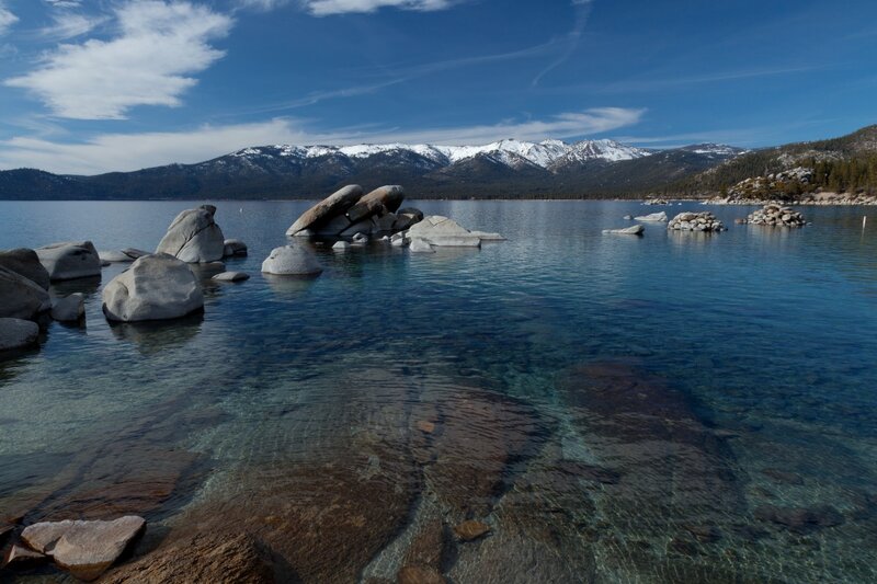 Clear Lake with Rocks — Blue, Serene, Afternoon