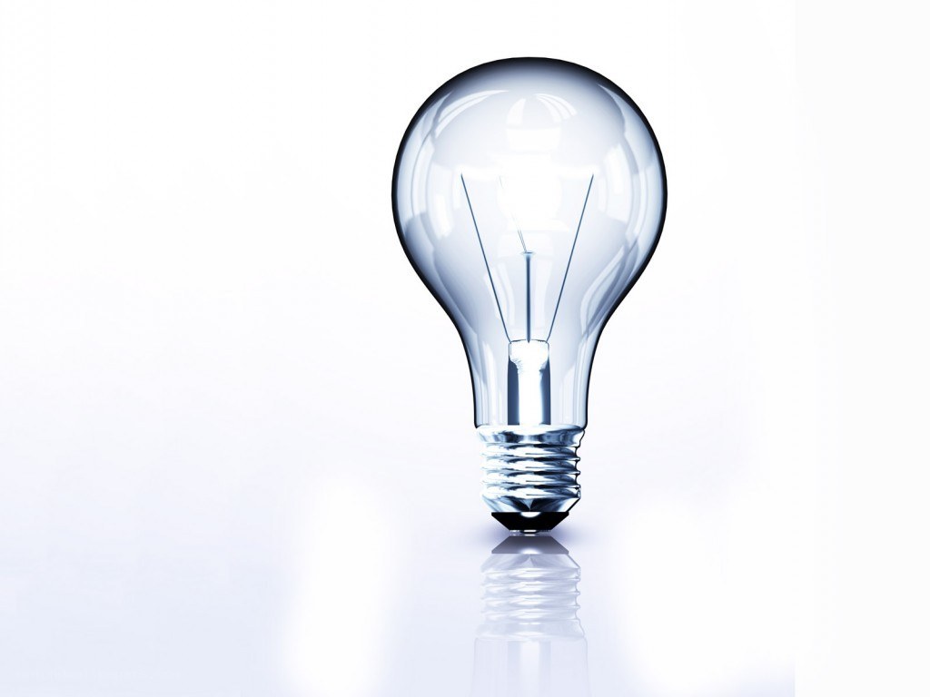 Clear light bulb on white background
