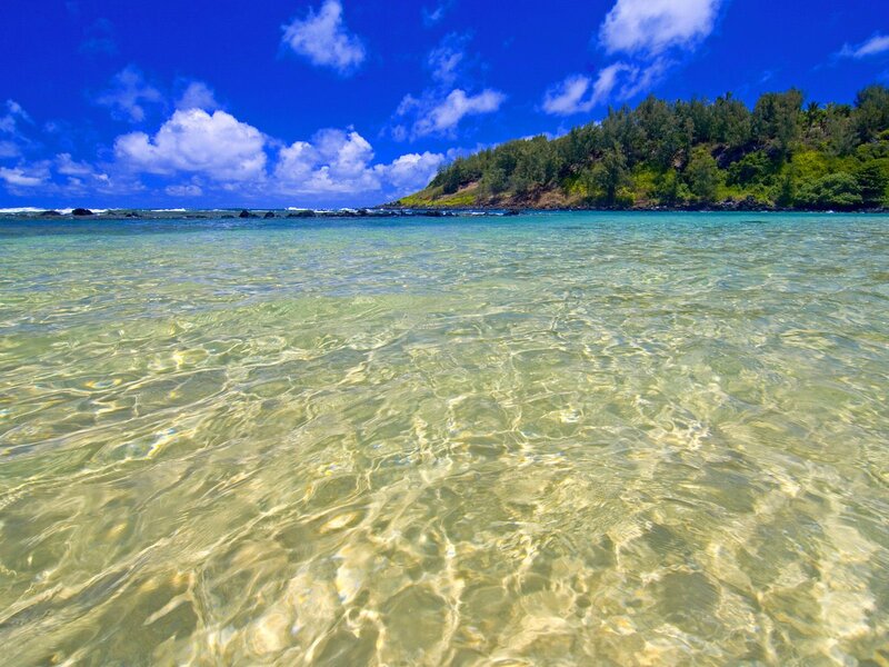 Clear ocean water with tropical island