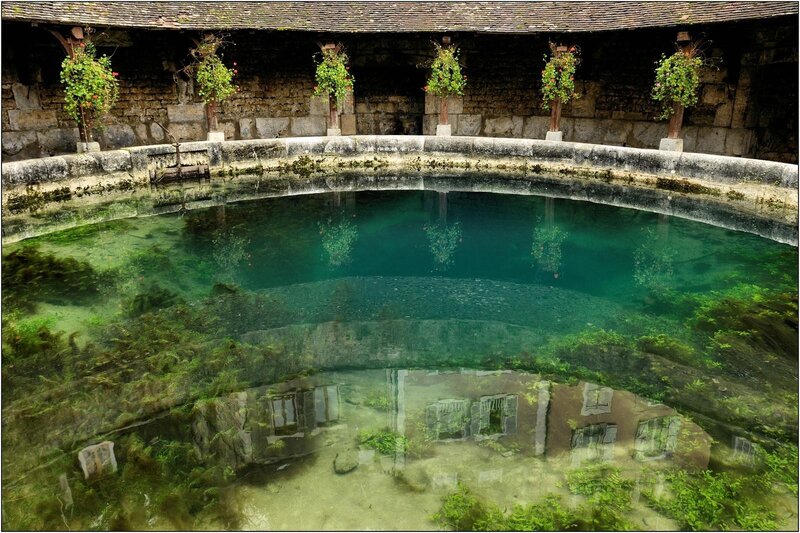 Clear pool in stone courtyard
