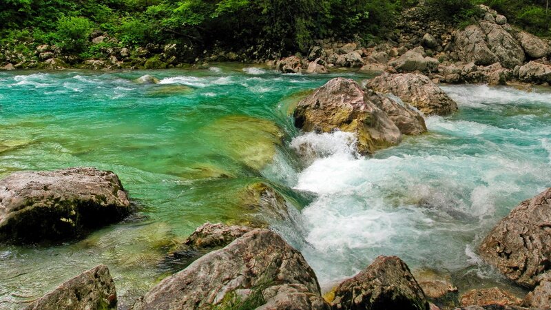 Clear river flowing over rocks