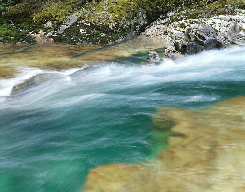 Clear river flowing over rocks