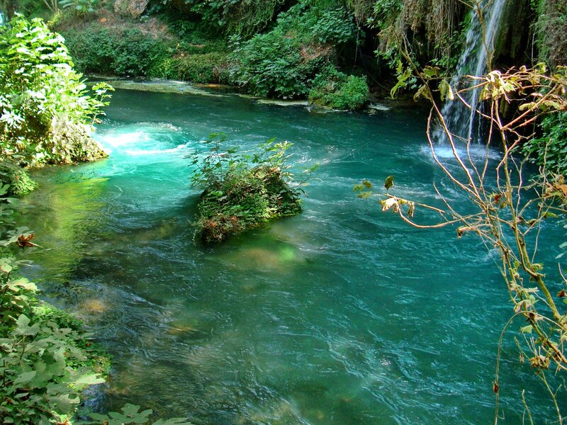 Clear river with waterfall