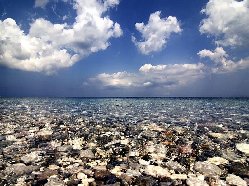 Clear sea with pebbles