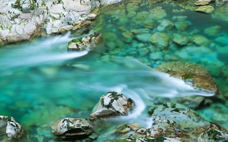Clear stream flowing over rocks