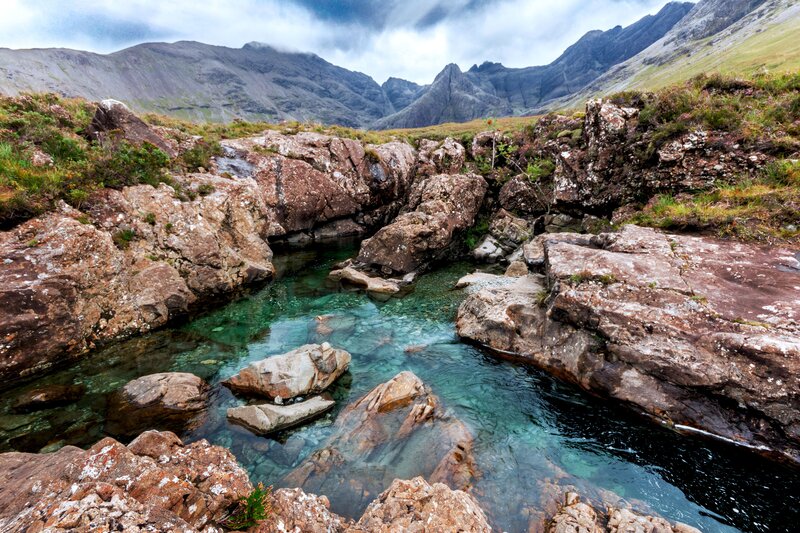 Clear Stream in Mountain Valley — Green, Dramatic