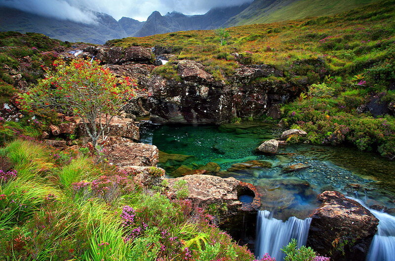 Clear Stream in Mountain Valley