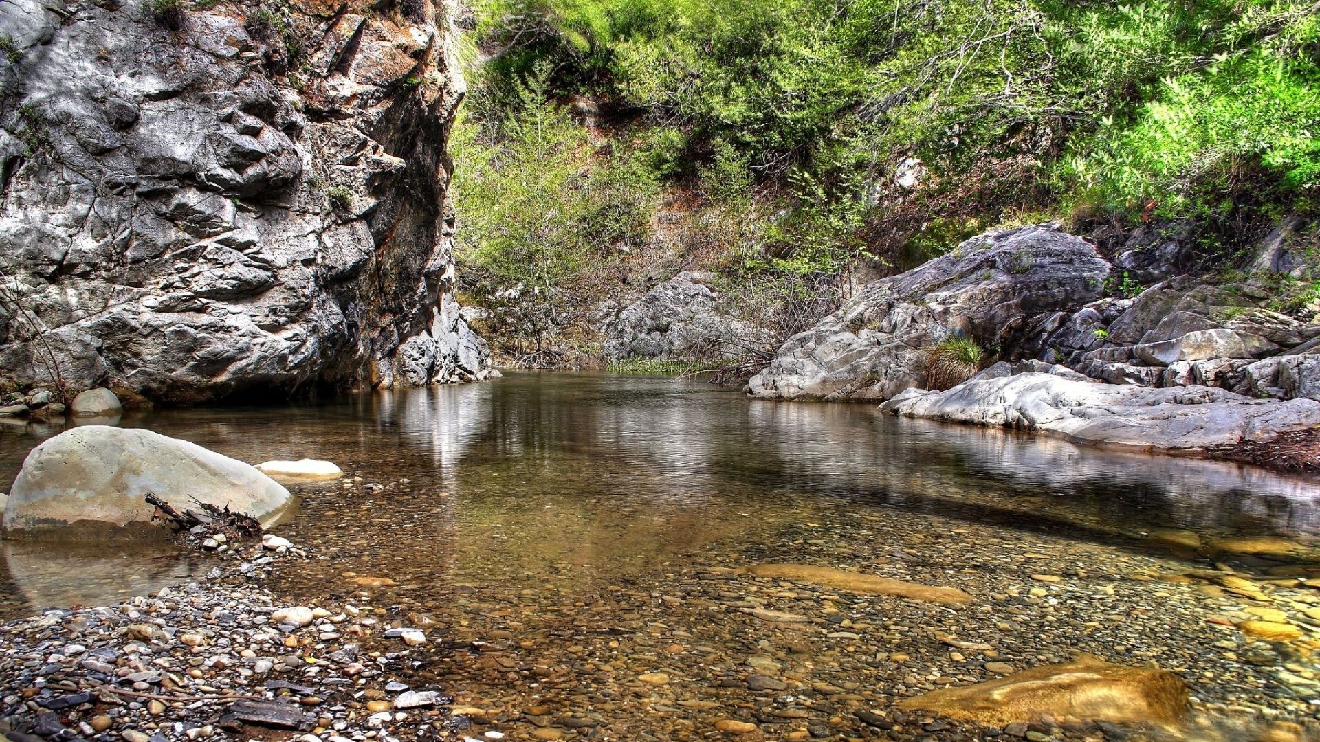 Clear stream in rocky canyon