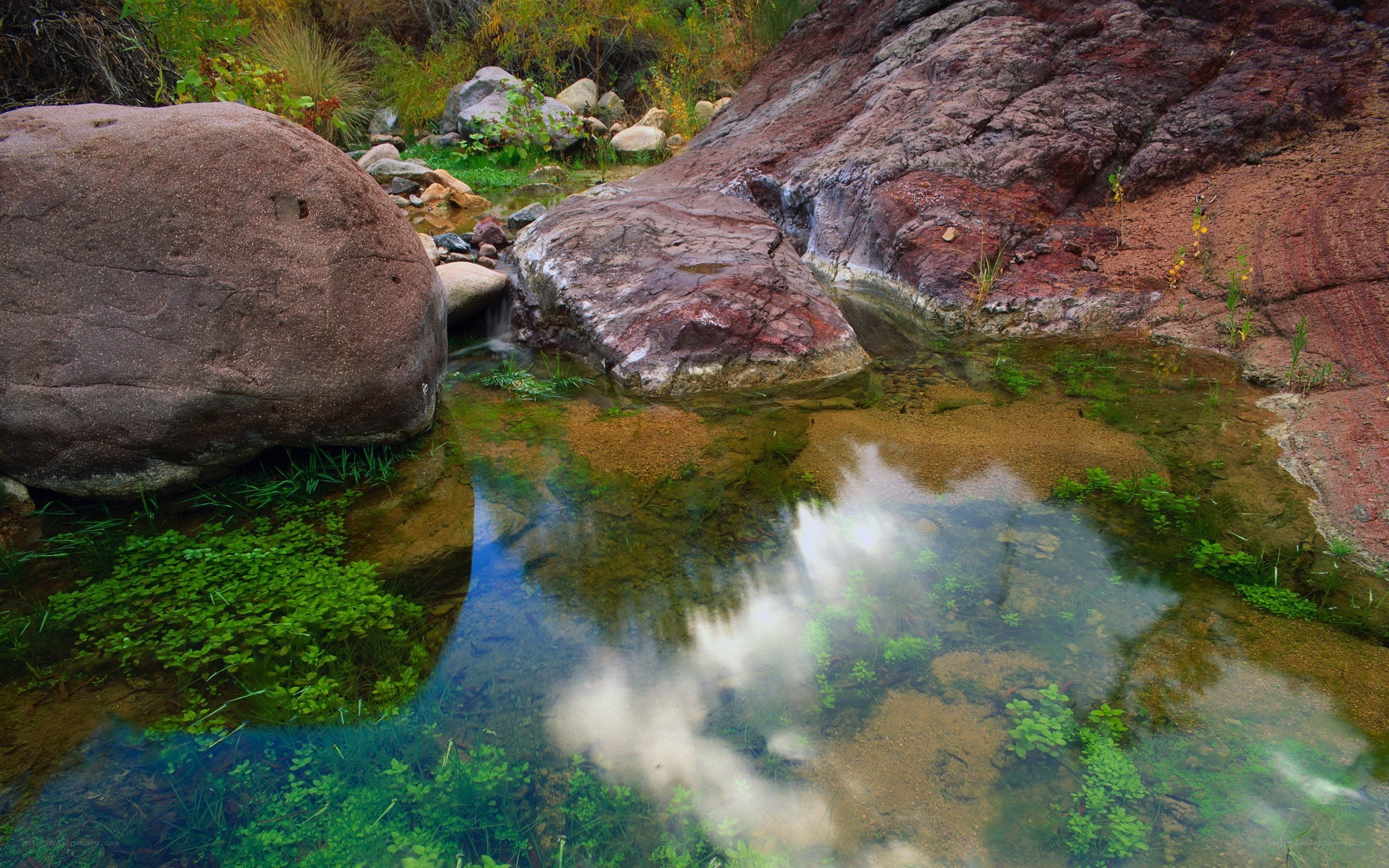 Clear stream in rocky landscape