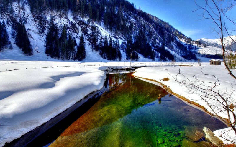 Clear Stream in Snow