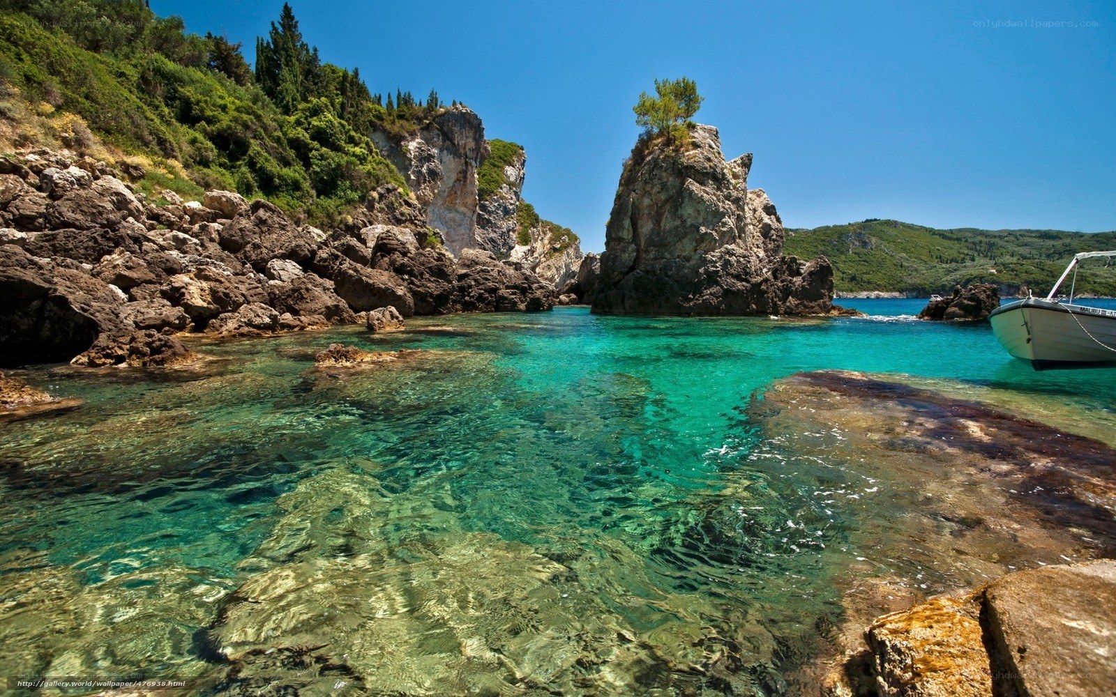 Clear turquoise cove with boat