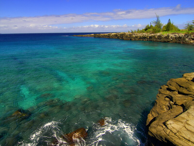 Clear turquoise waters at coastal cove