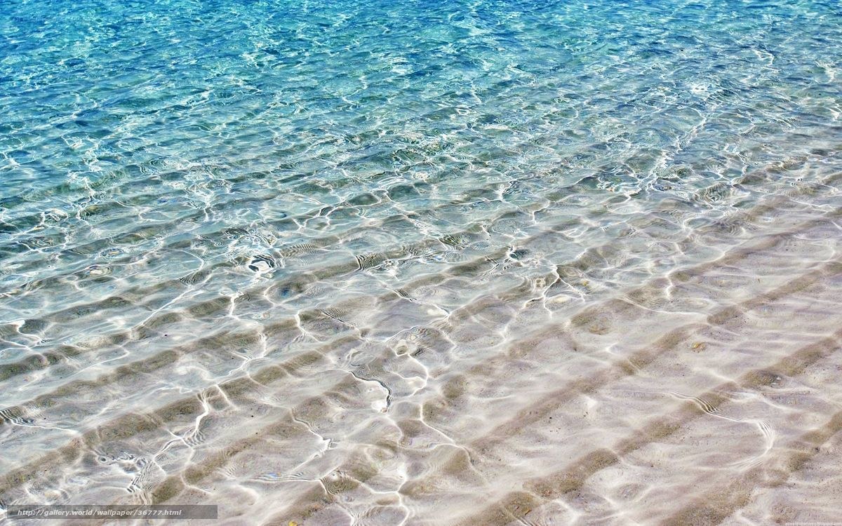 Clear water on sandy beach