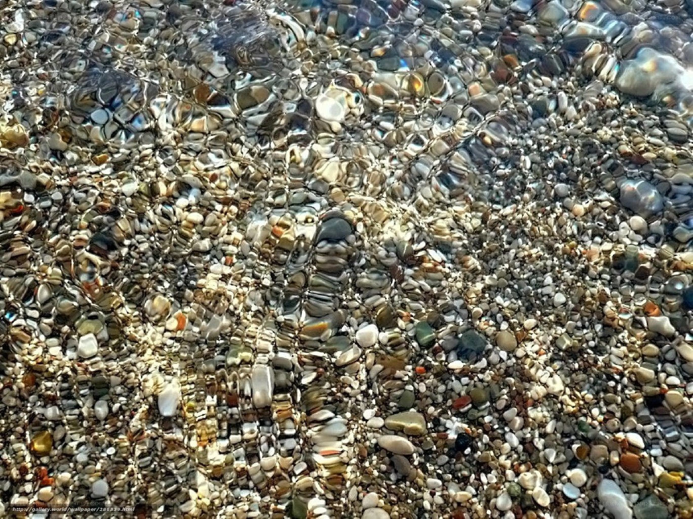 Clear water over pebbles