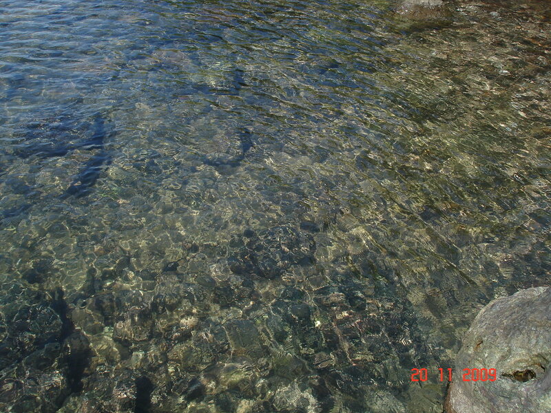Clear Water over Rocks — Blue, Calm, Afternoon