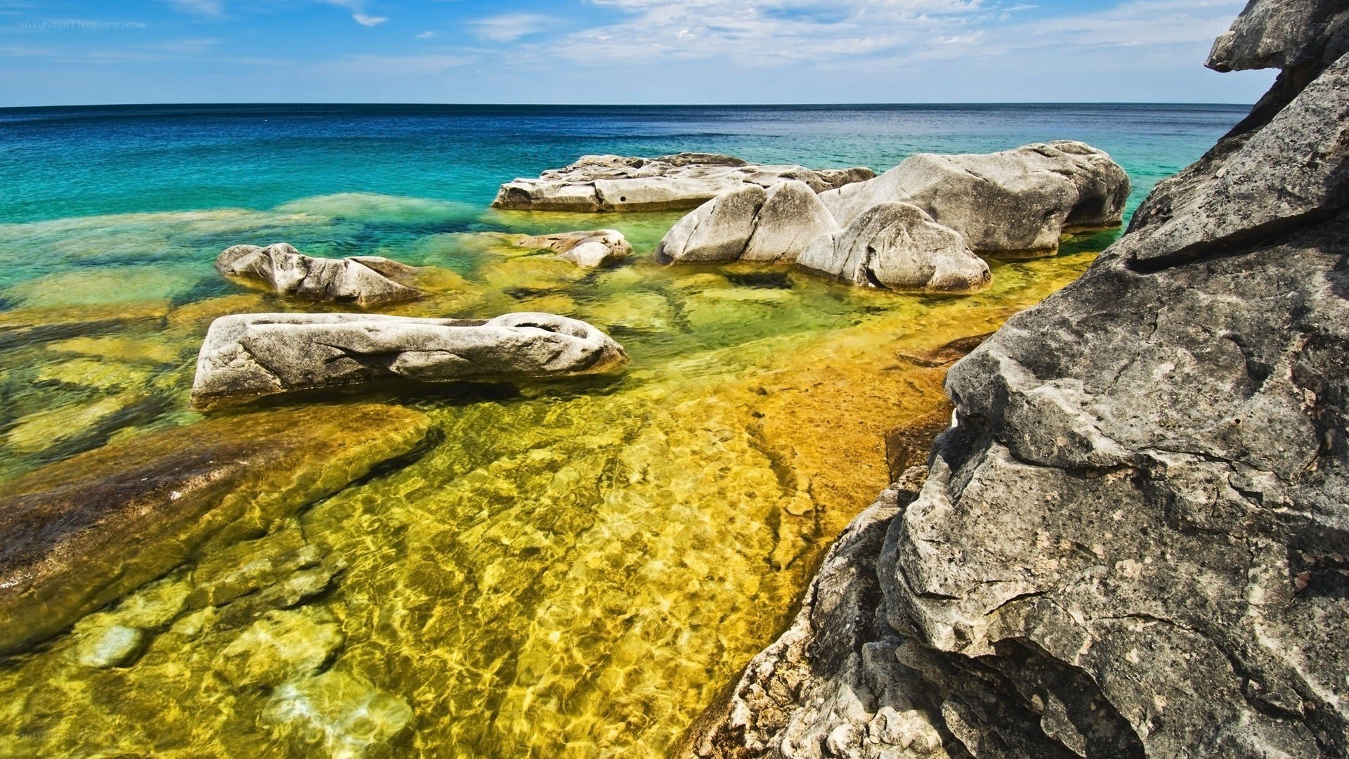 Clear water rocky shoreline
