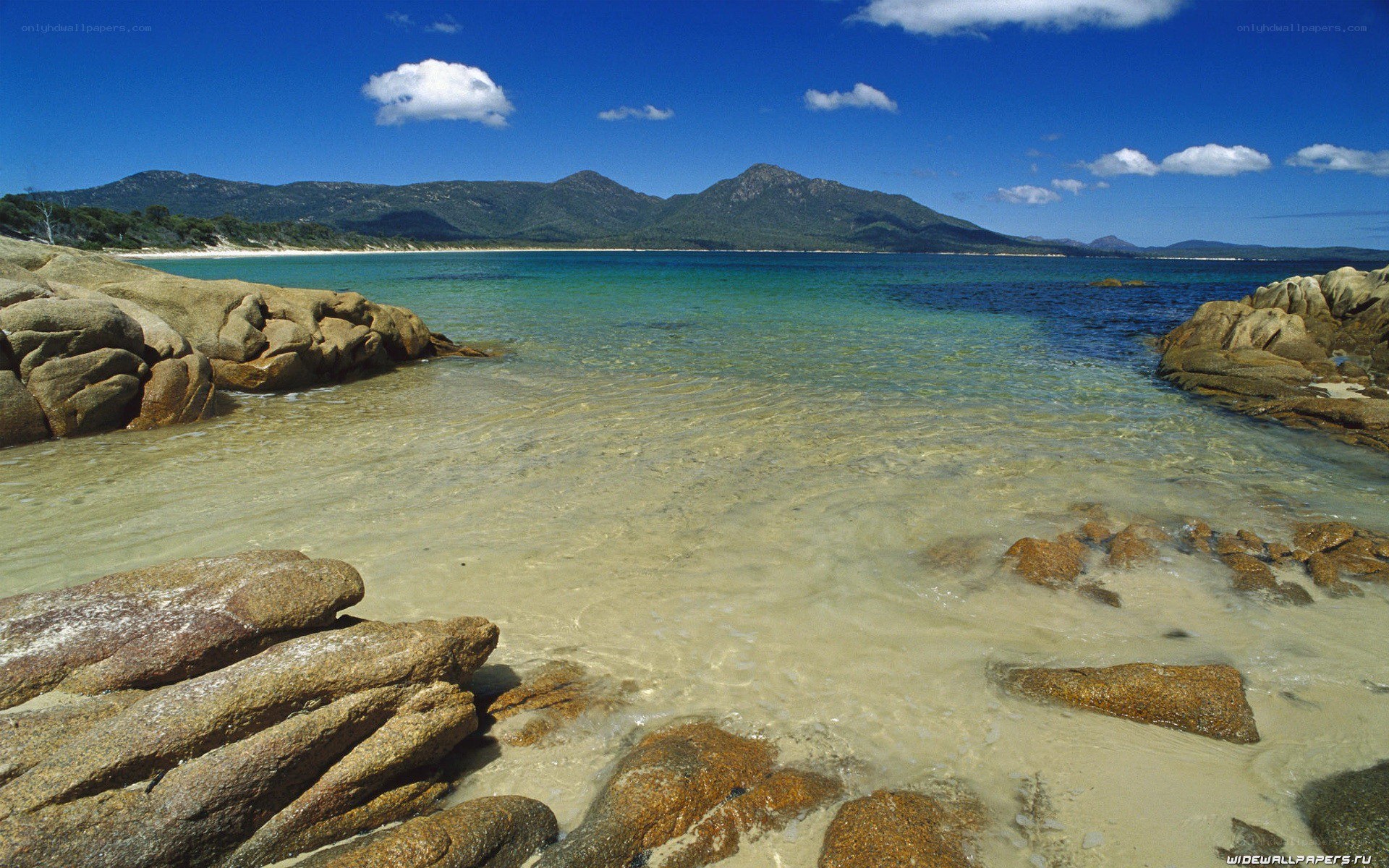 Clear waters and rocky beach