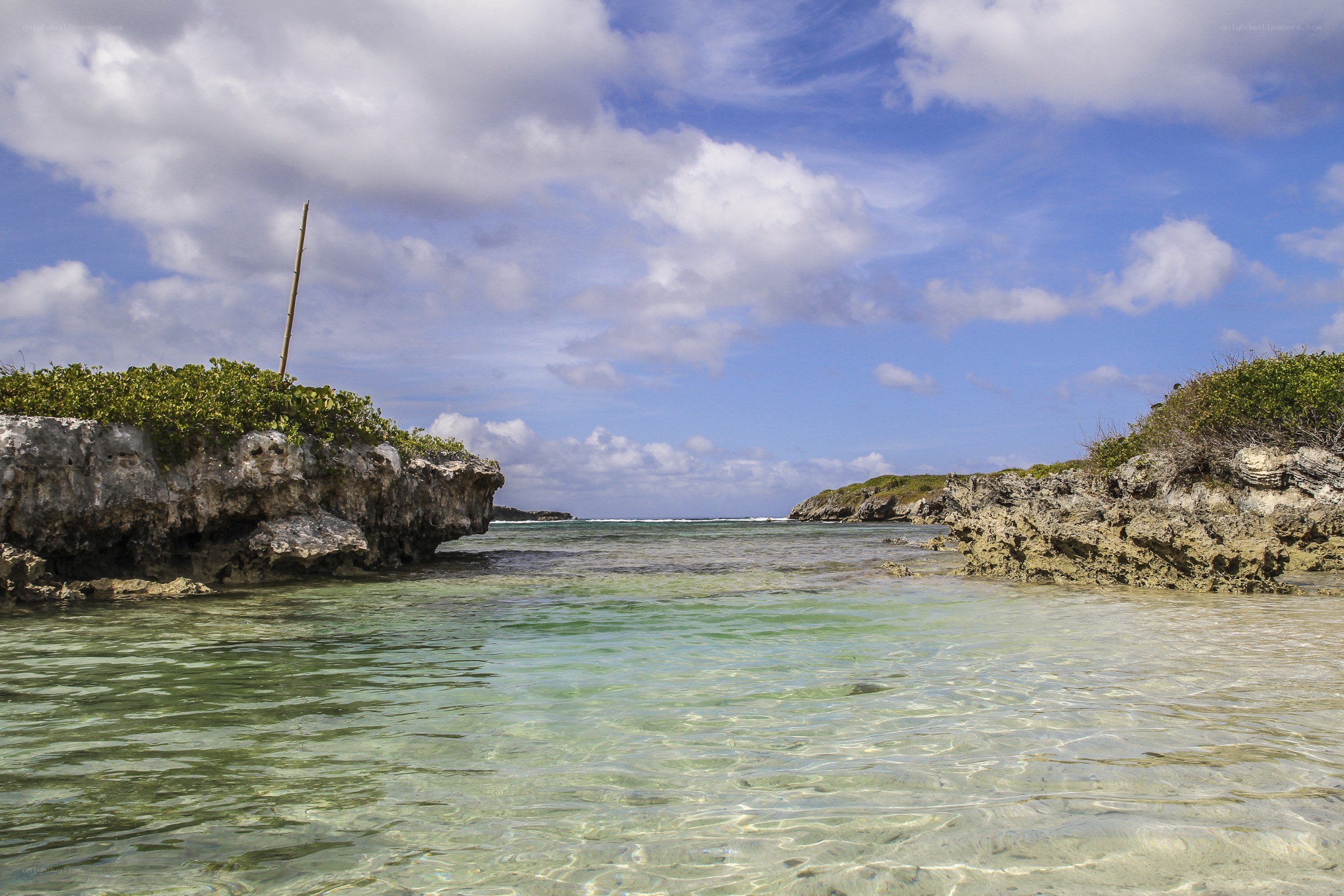 Clear waters between rocky islets