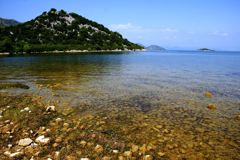 Clear waters near a rocky island