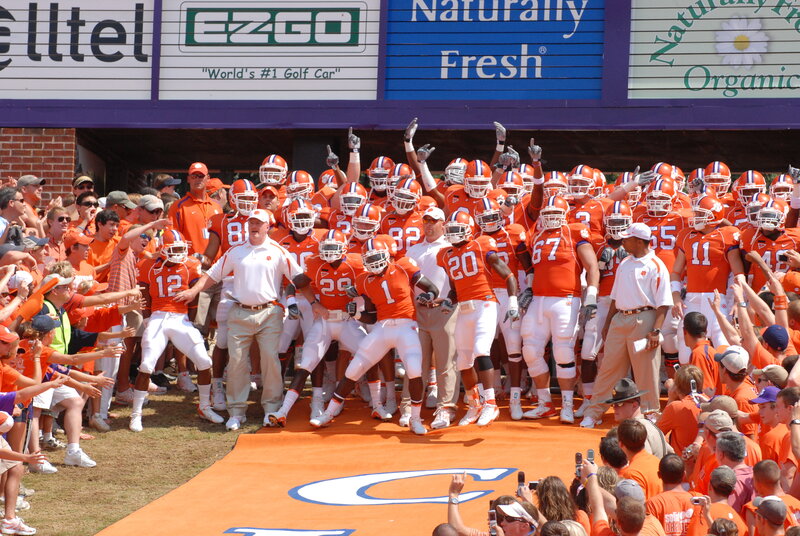 Clemson football team entering stadium