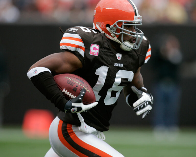 Cleveland Browns player running with ball