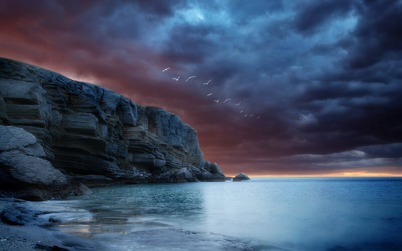 Cliff by the Sea — Blue, Dramatic, Sunset