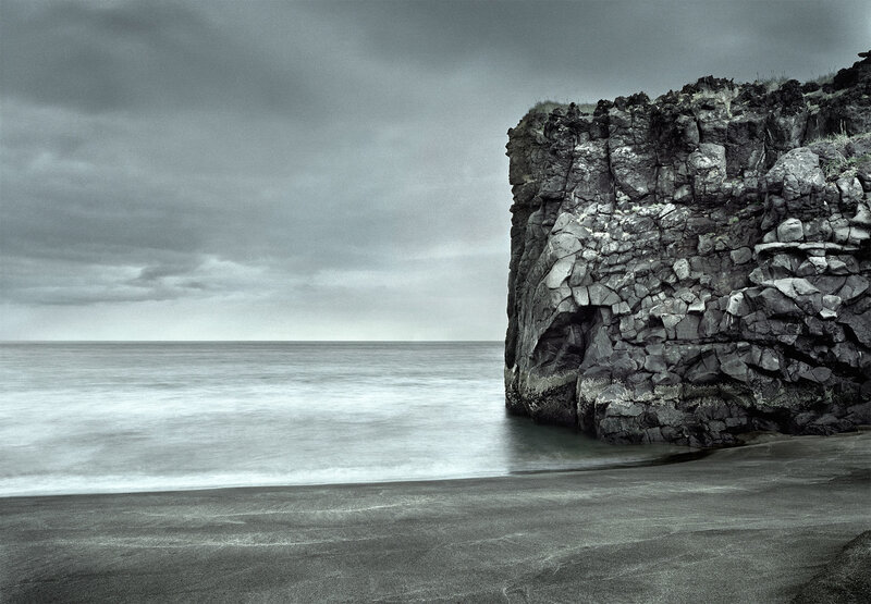 Cliff by the sea on a cloudy day