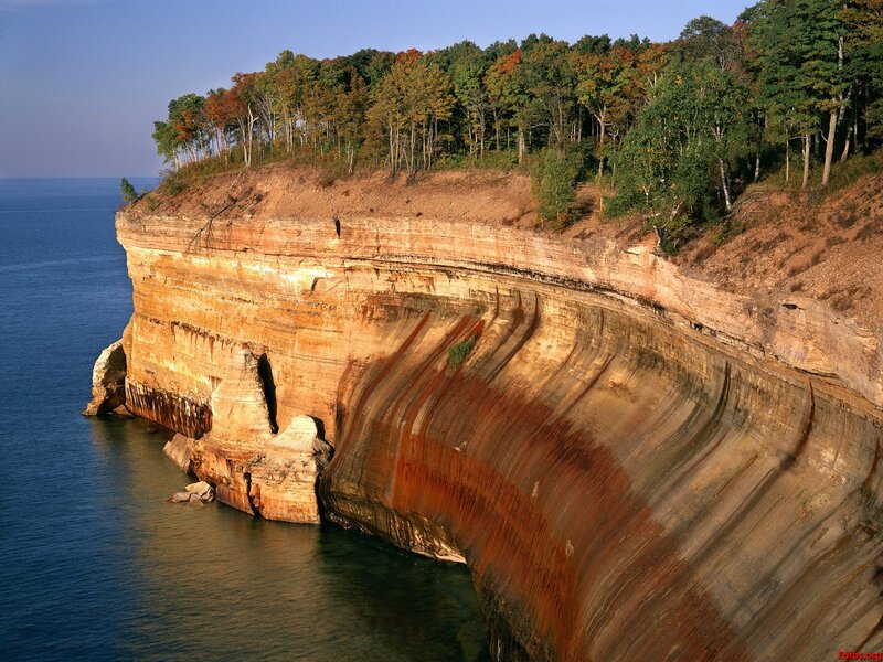 Cliff Face by Lake — Blue
