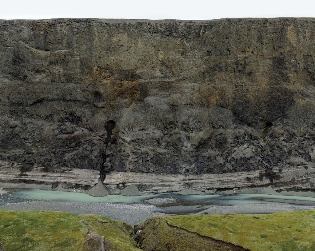 cliff face with river