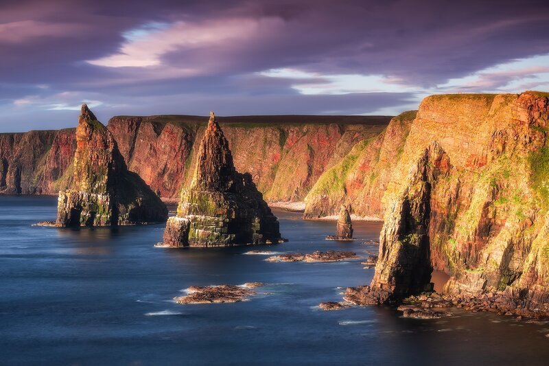 Cliff Formations in Sea — Blue