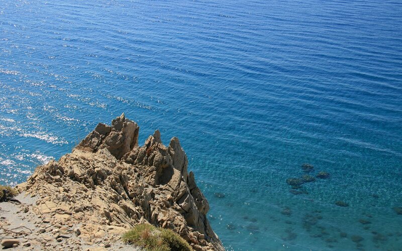 Cliff overlooking blue sea