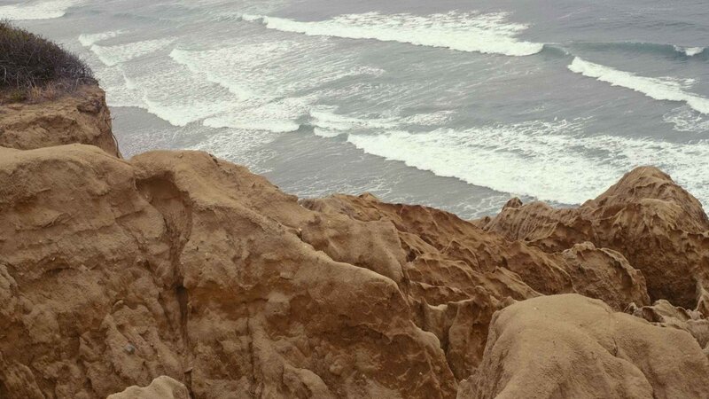 Cliff Overlooking Ocean — Brown
