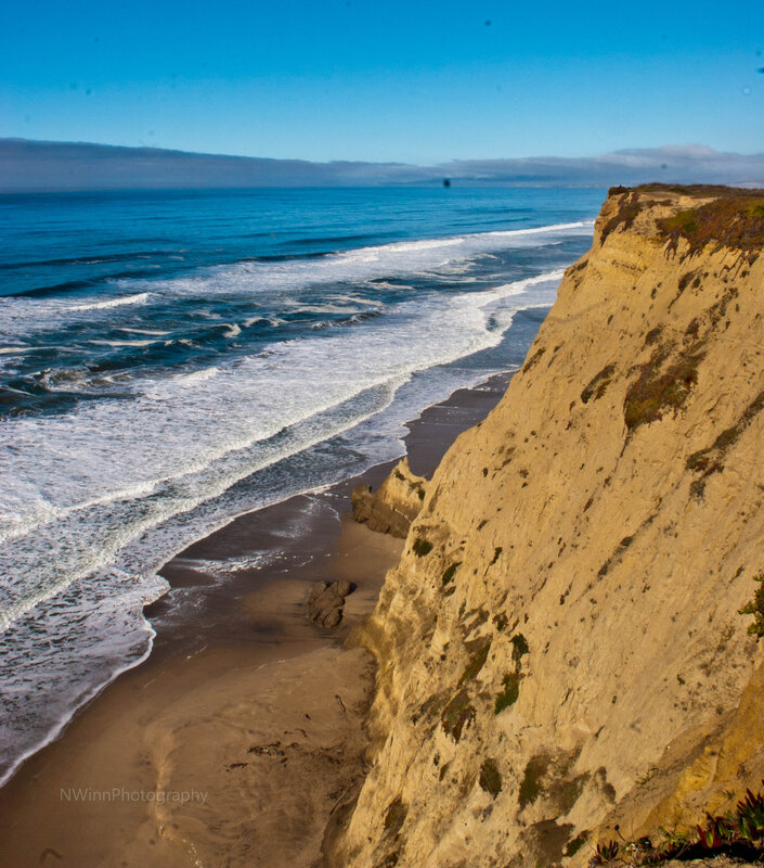 cliff overlooking ocean waves