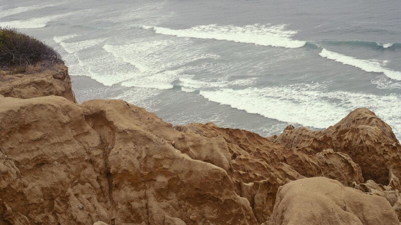 cliff overlooking ocean waves