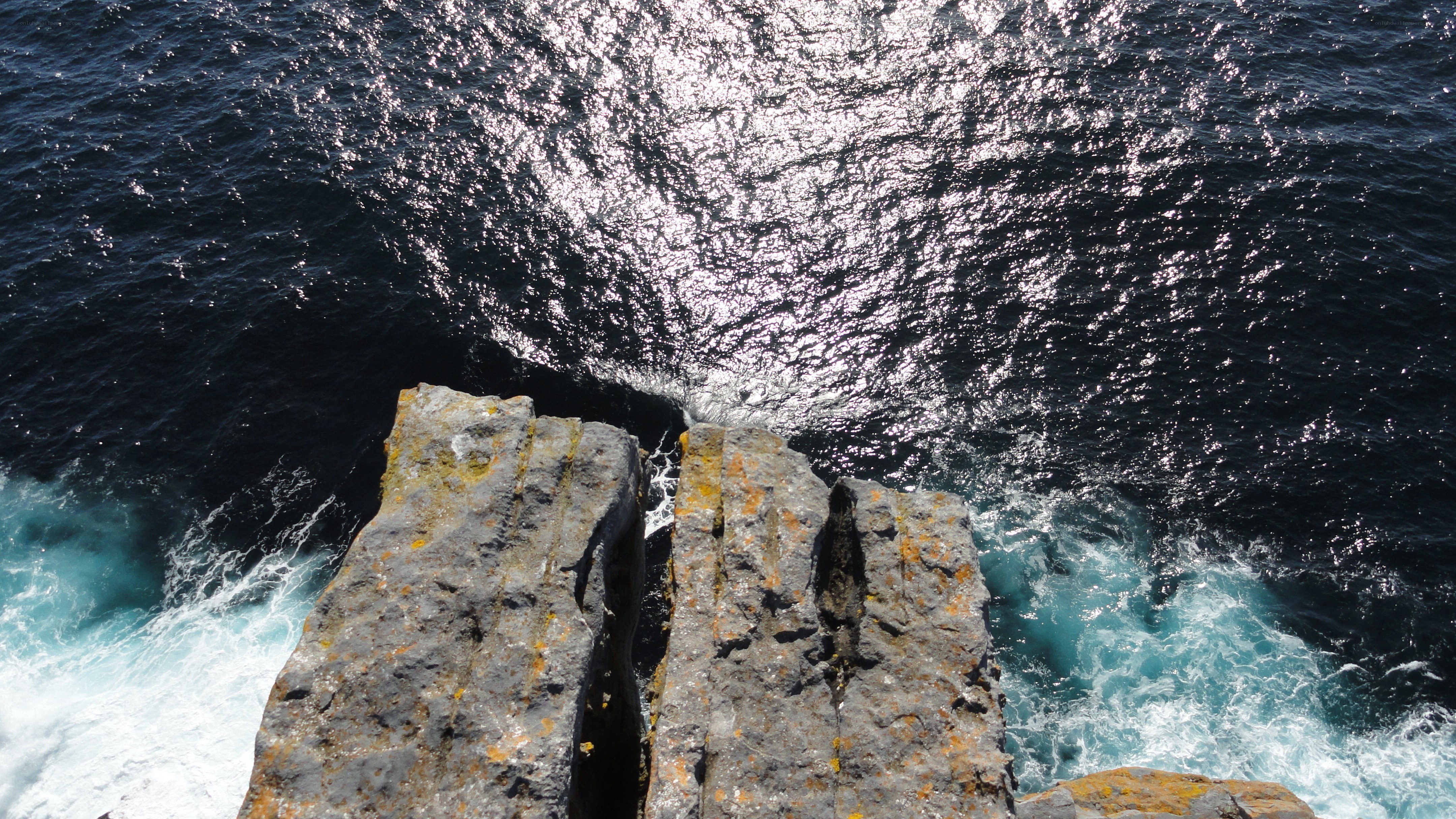 cliff overlooking ocean waves