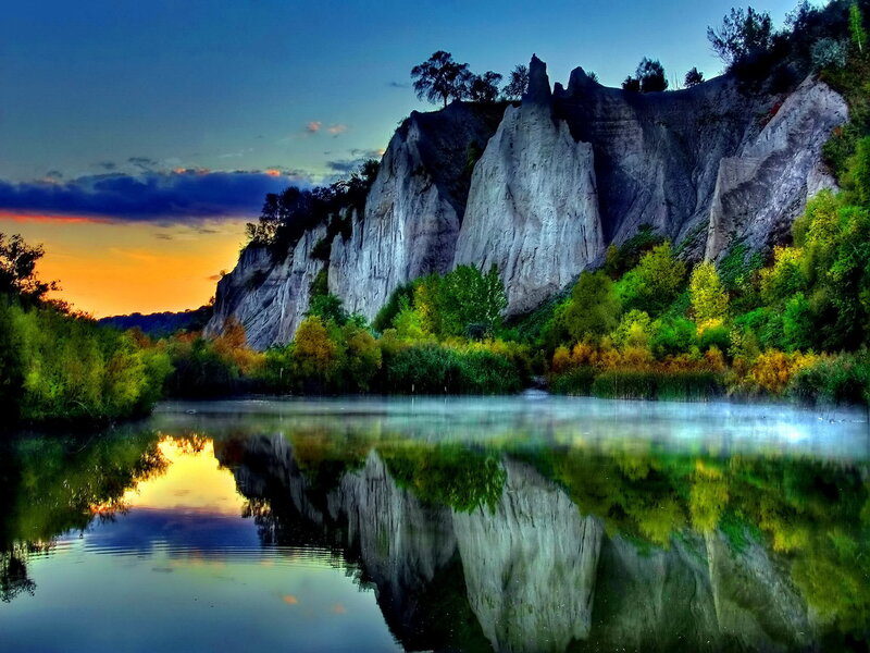 Cliff Reflected in Lake — Blue