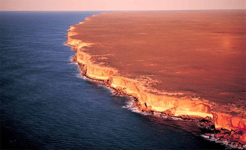 Cliffs Along Ocean Coast — Blue, Dramatic, Sunset