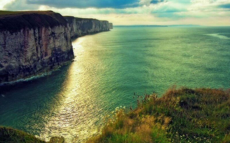 Cliffs Along Ocean Coast — Green, Dramatic, Sunset, Photograph