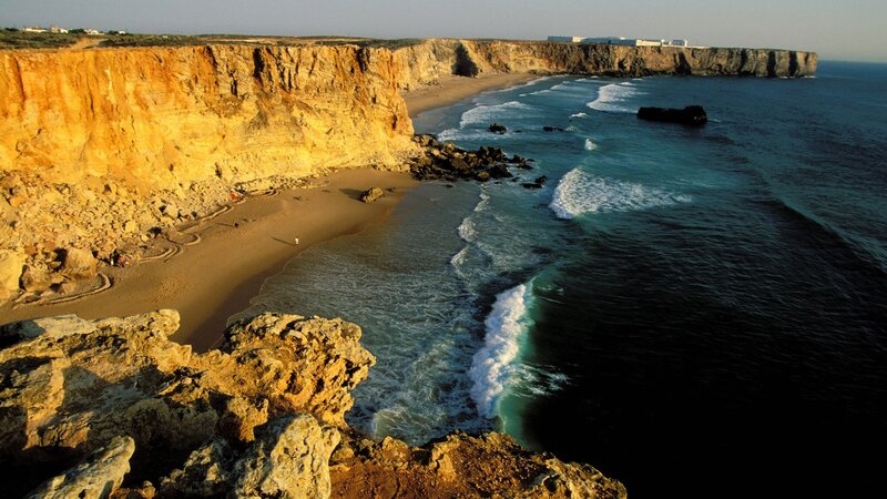 cliffs and ocean at sunset