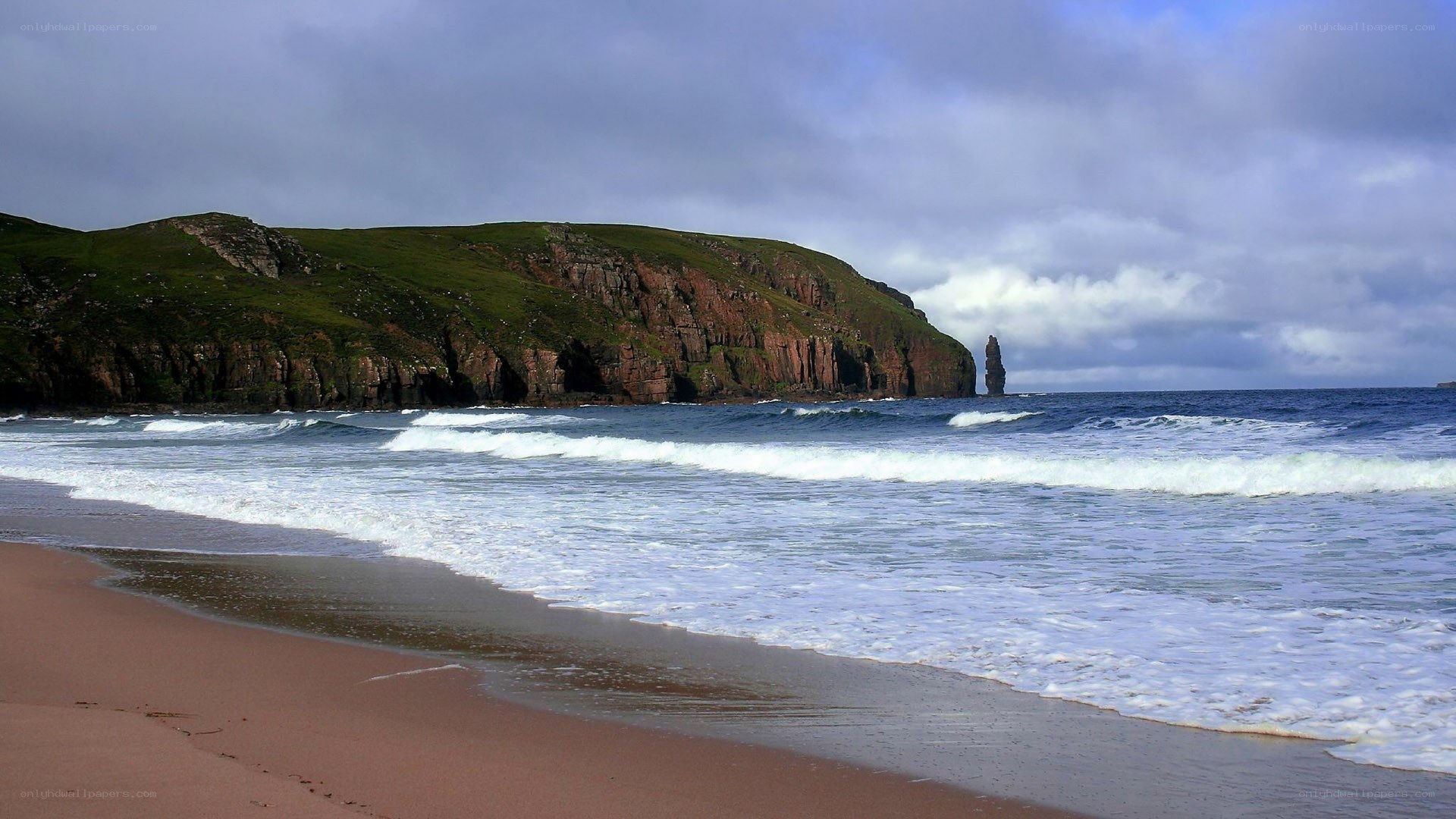 cliffs and sea at a sandy beach
