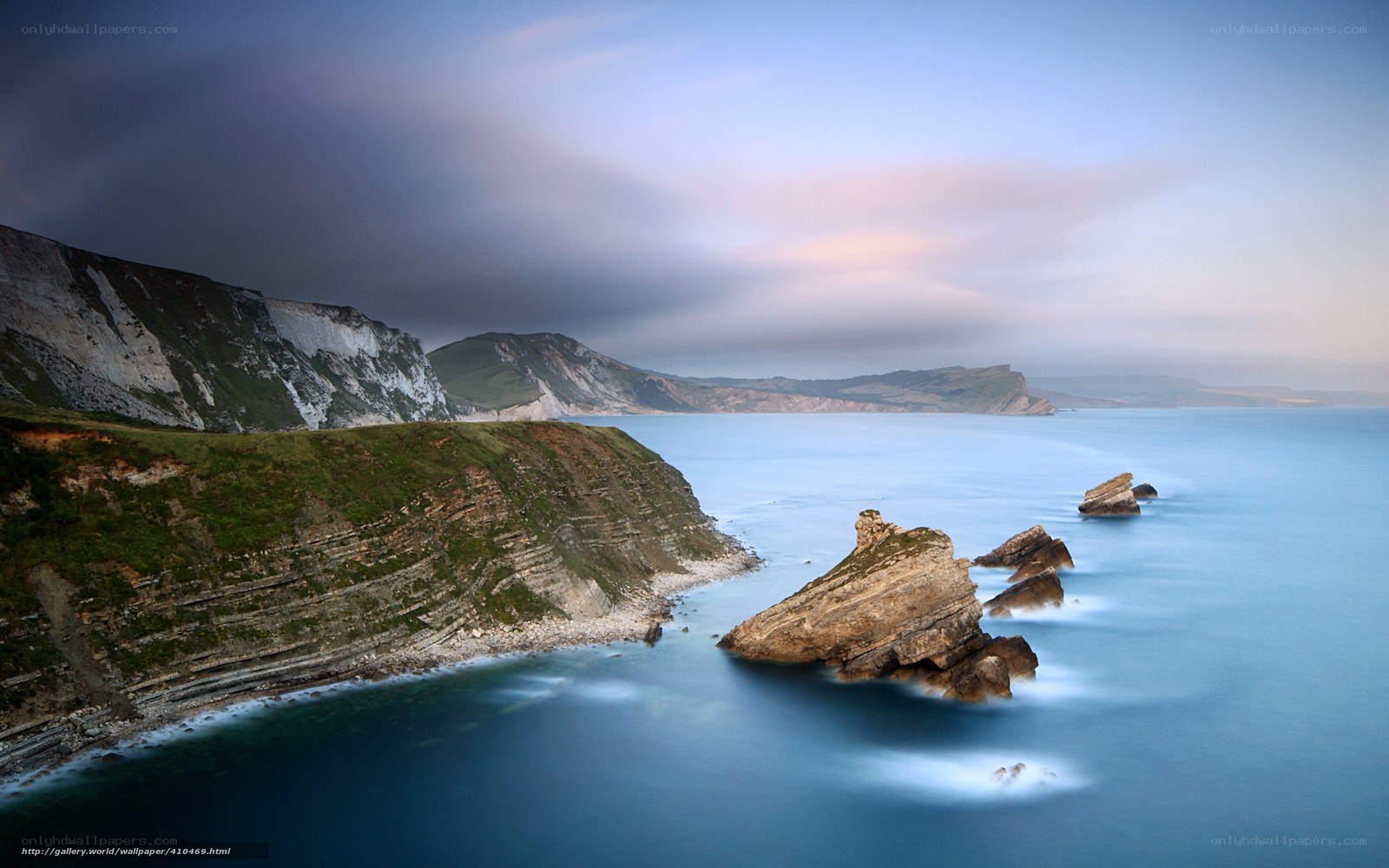 Cliffs and sea at dusk