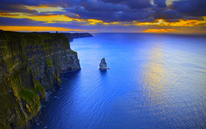 Cliffs and Sea at Sunset