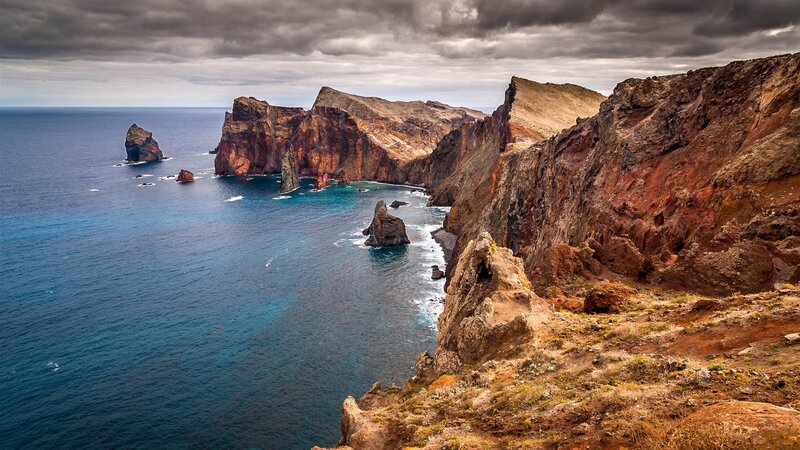 Cliffs and Sea Stacks — Blue, Dramatic, Photograph, Ocean, Sky, Rocks, Brown, Gray