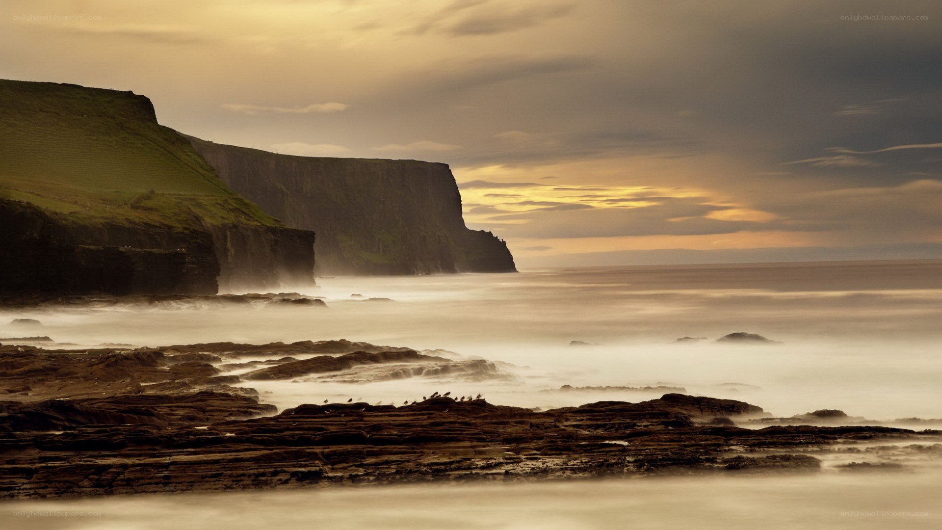 Cliffs at sunset by the sea