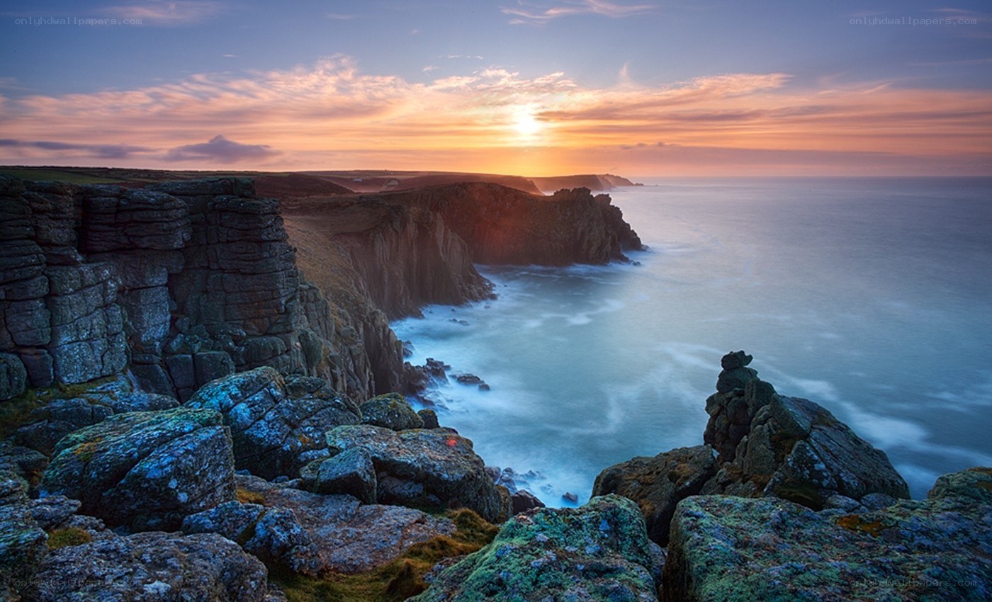 Cliffs at sunset by the sea
